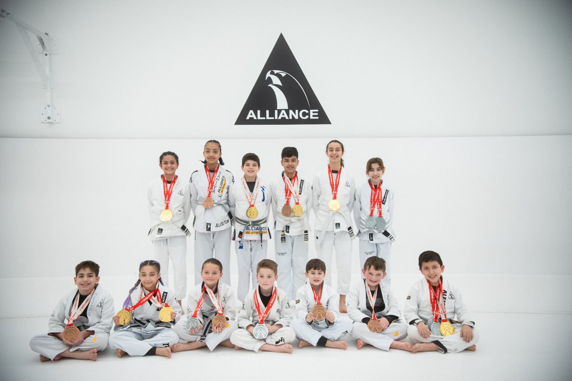 Youth competition team posing with their medals